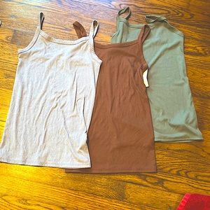 3 tank tops never worn.